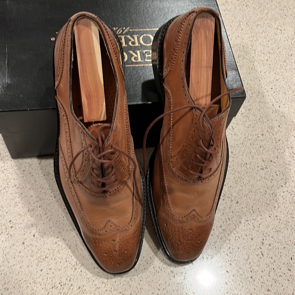 Well cared for pair of tan derby wingtips size 10.5